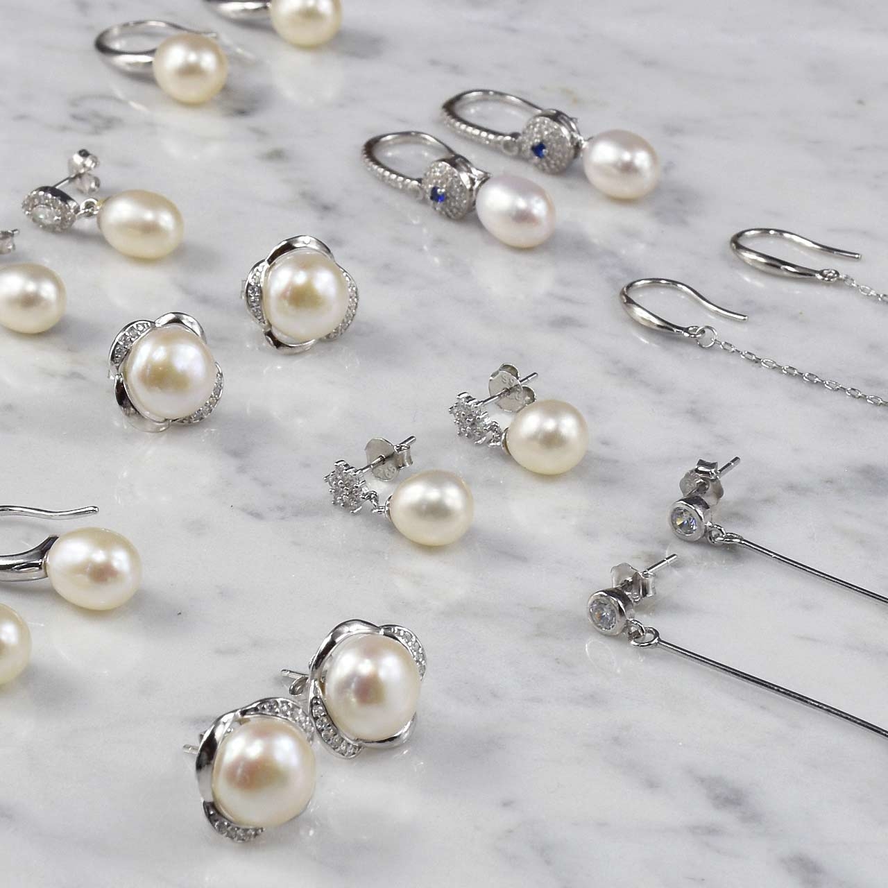 Parel oorbellen met zirkonia en unieke zoetwater parels