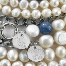 Close-up of handmade pearl necklaces from the Claude X Proud Pearl collection